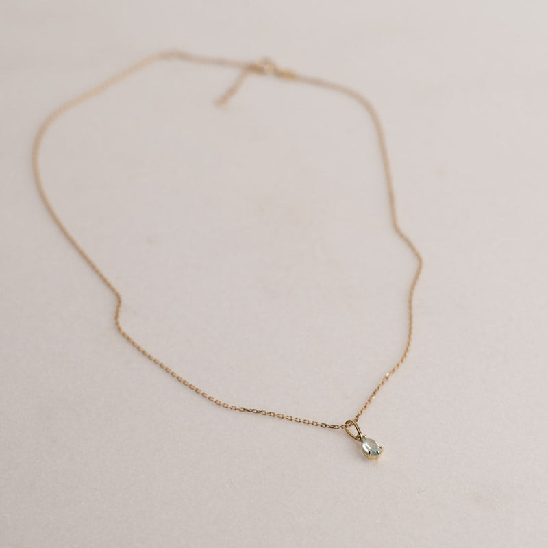 ADA BLUE TOPAZ SOLID GOLD PENDANT