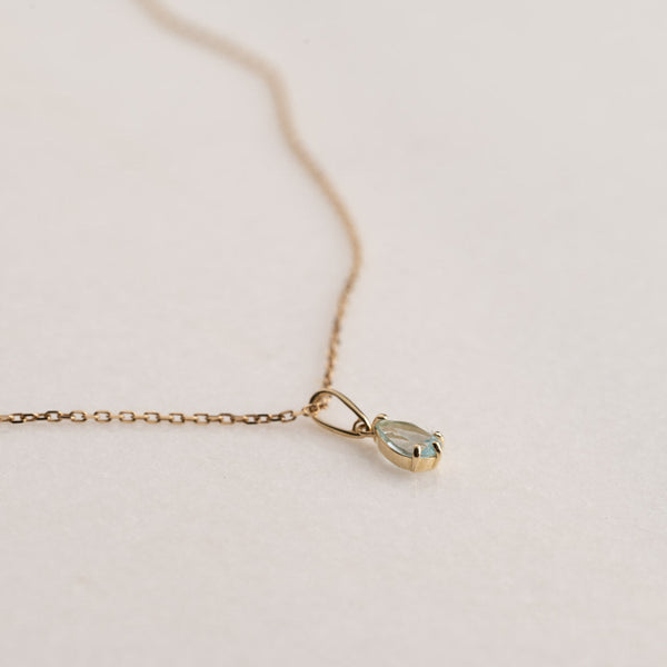 ADA BLUE TOPAZ SOLID GOLD PENDANT