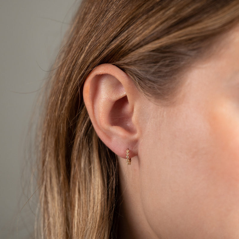 MILEY WHITE TOPAZ SOLID GOLD EARRING
